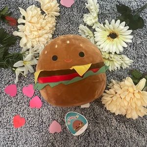 The Brand is Squishmellow, It’s a 8inch, His name is Carl!